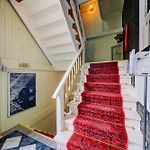 The Twin Lions: Bespoke Travel Lodge W/ Speakeasy*