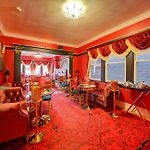 The Twin Lions: Bespoke Travel Lodge W/ Speakeasy*