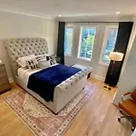 Urban Mansion Featuring A Rooftop City, City Views, And Basketball Court