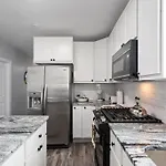 Newly Rehabbed Greystone With 2 Private Apartments, Backyard, Garage, Laundry, Close To Expressway *