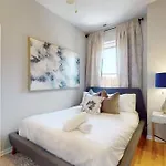 Sleek Urban Retreat Steps From Il Med District