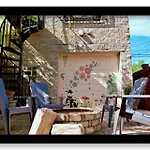 The Banksy-Greystone Rooftop Firepit United Center