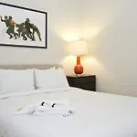 Four-Bedroom On W Grace Street Apt 1W