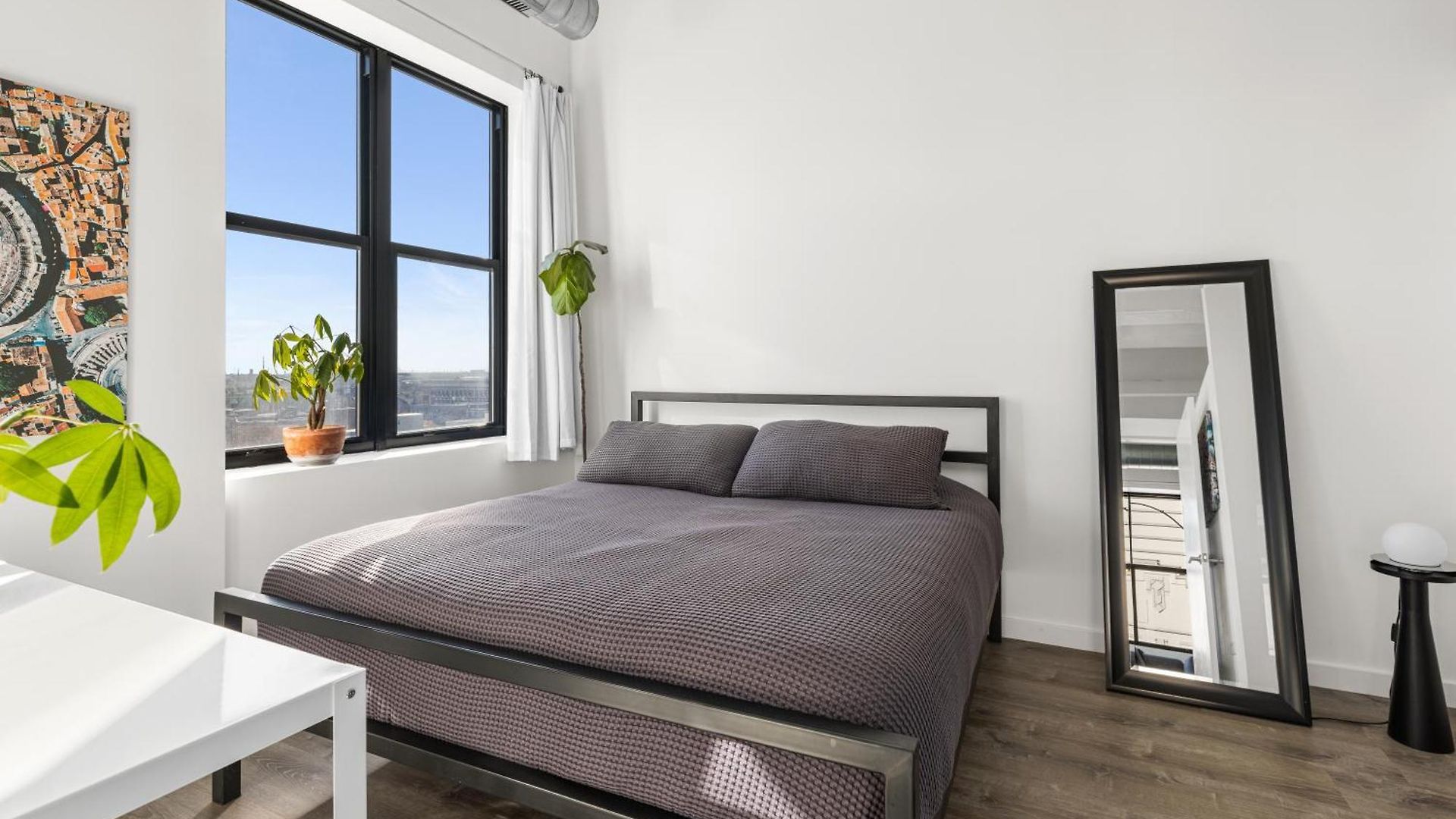 Modern Historic Loft 19ft Ceilings, Gym, Heated Parking, Skyline Views, Balcony