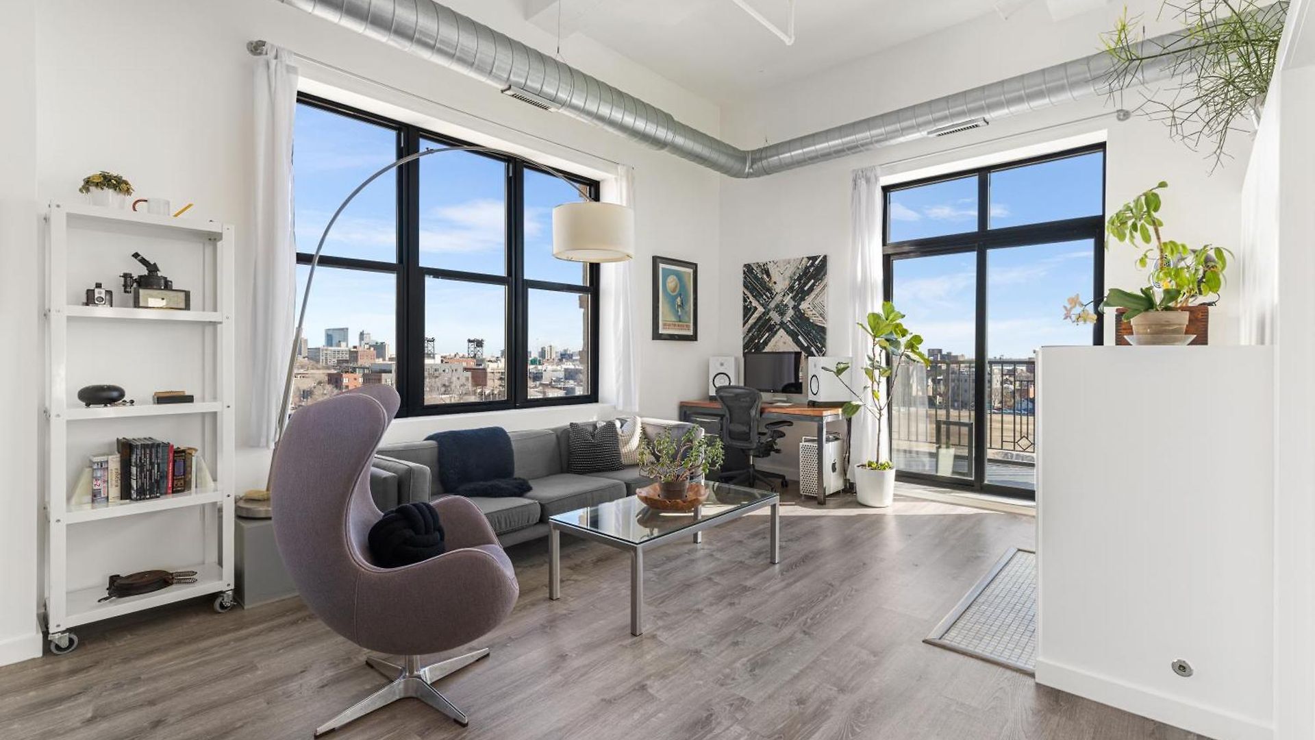 Modern Historic Loft 19ft Ceilings, Gym, Heated Parking, Skyline Views, Balcony