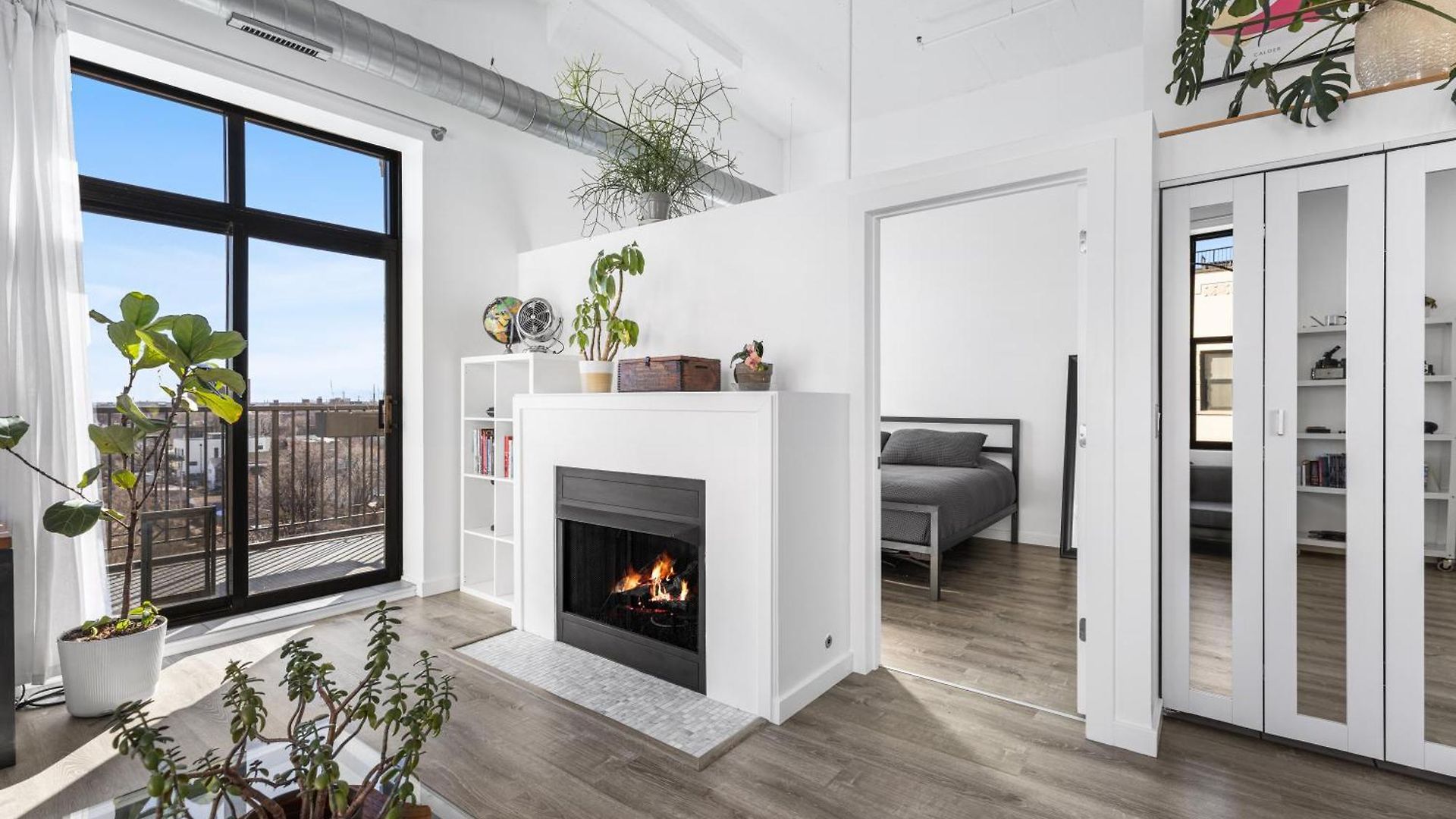 Modern Historic Loft 19ft Ceilings, Gym, Heated Parking, Skyline Views, Balcony *
