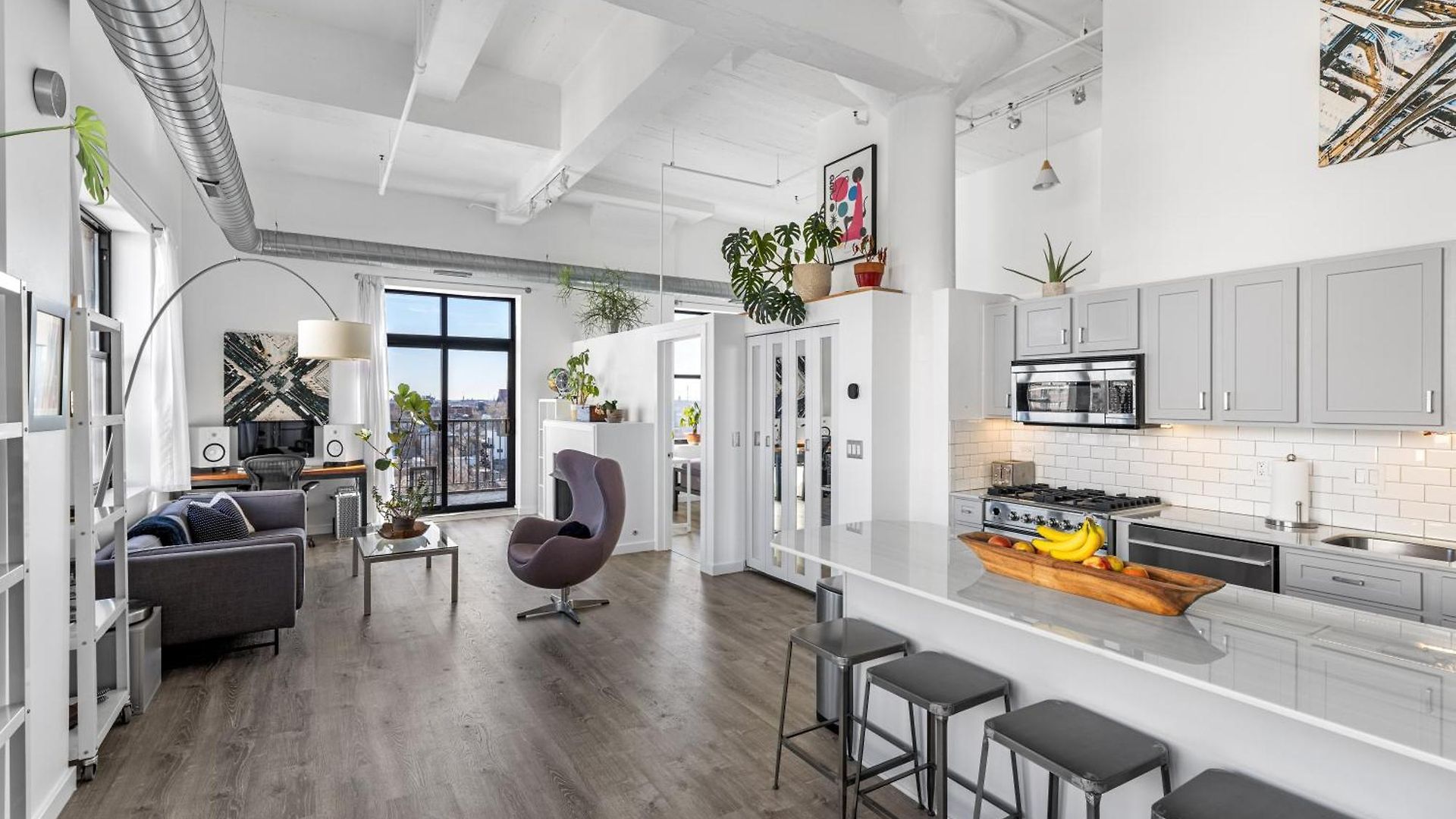 Modern Historic Loft 19ft Ceilings, Gym, Heated Parking, Skyline Views, Balcony Apartment *