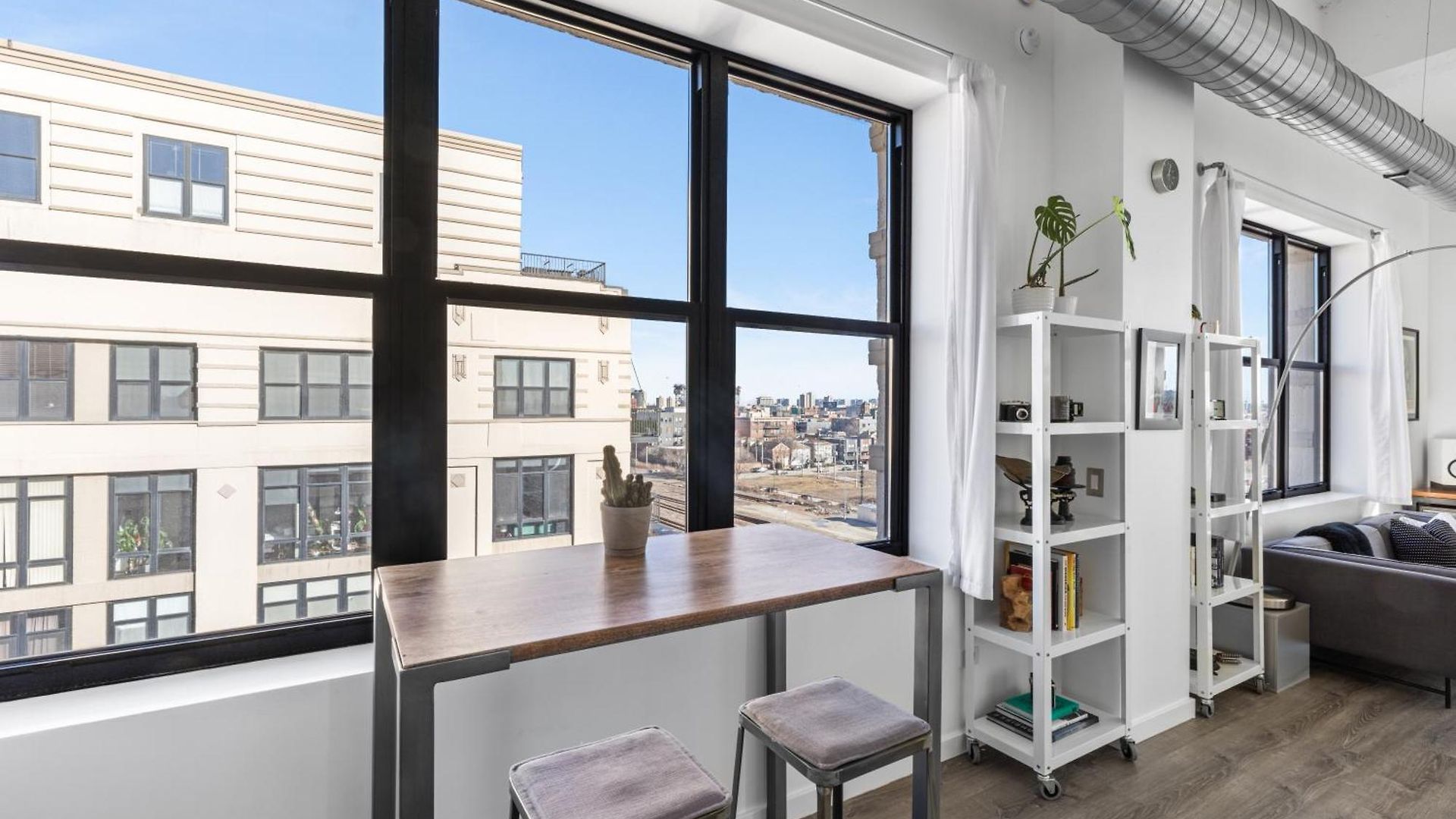 Modern Historic Loft 19ft Ceilings, Gym, Heated Parking, Skyline Views, Balcony *