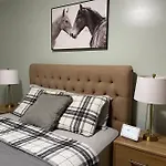 Lovely 2-Bedrm Condo With Free Parking On Premises