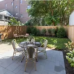 French Design-Inspired West Loop Apartment With Private Balcony & Large Backyard Condo