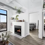 Modern Historic Loft 19Ft Ceilings, Gym, Heated Parking, Skyline Views, Balcony