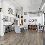 Modern Historic Loft 19Ft Ceilings, Gym, Heated Parking, Skyline Views, Balcony