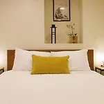 The Banksy-Greystone Rooftop Firepit United Center