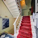 The Twin Lions: Bespoke Travel Lodge W/ Speakeasy*