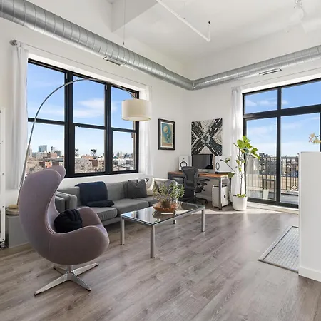 Modern Historic Loft 19ft Ceilings, Gym, Heated Parking, Skyline Views, Balcony