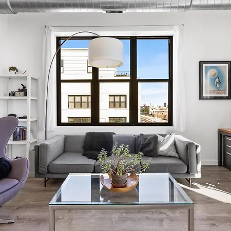 Modern Historic Loft 19ft Ceilings, Gym, Heated Parking, Skyline Views, Balcony Apartment