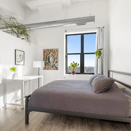 Modern Historic Loft 19ft Ceilings, Gym, Heated Parking, Skyline Views, Balcony Apartment