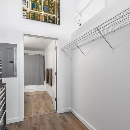Modern Historic Loft 19ft Ceilings, Gym, Heated Parking, Skyline Views, Balcony
