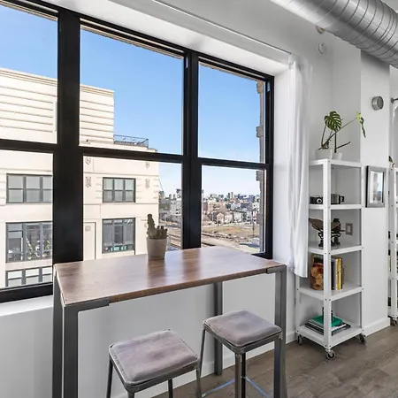 Modern Historic Loft 19ft Ceilings, Gym, Heated Parking, Skyline Views, Balcony *